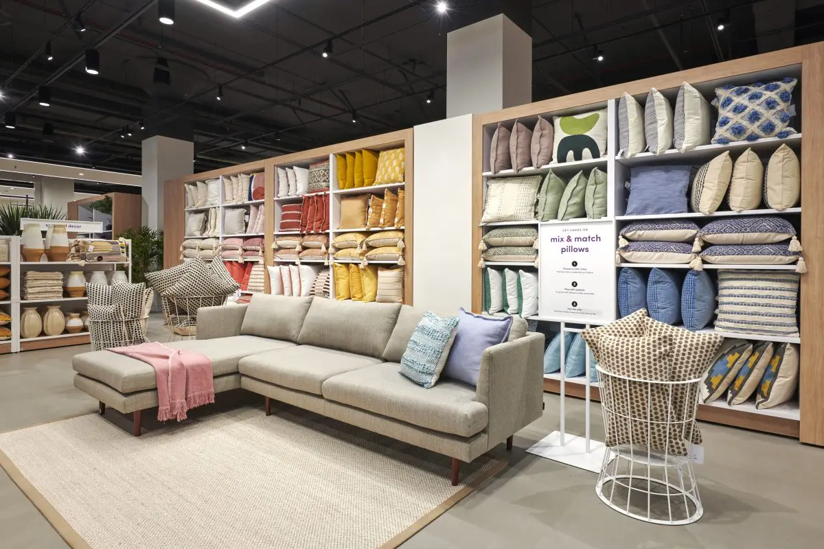 JT Magen Completes Wayfair’s First Store in Wilmette showroom pillow couch